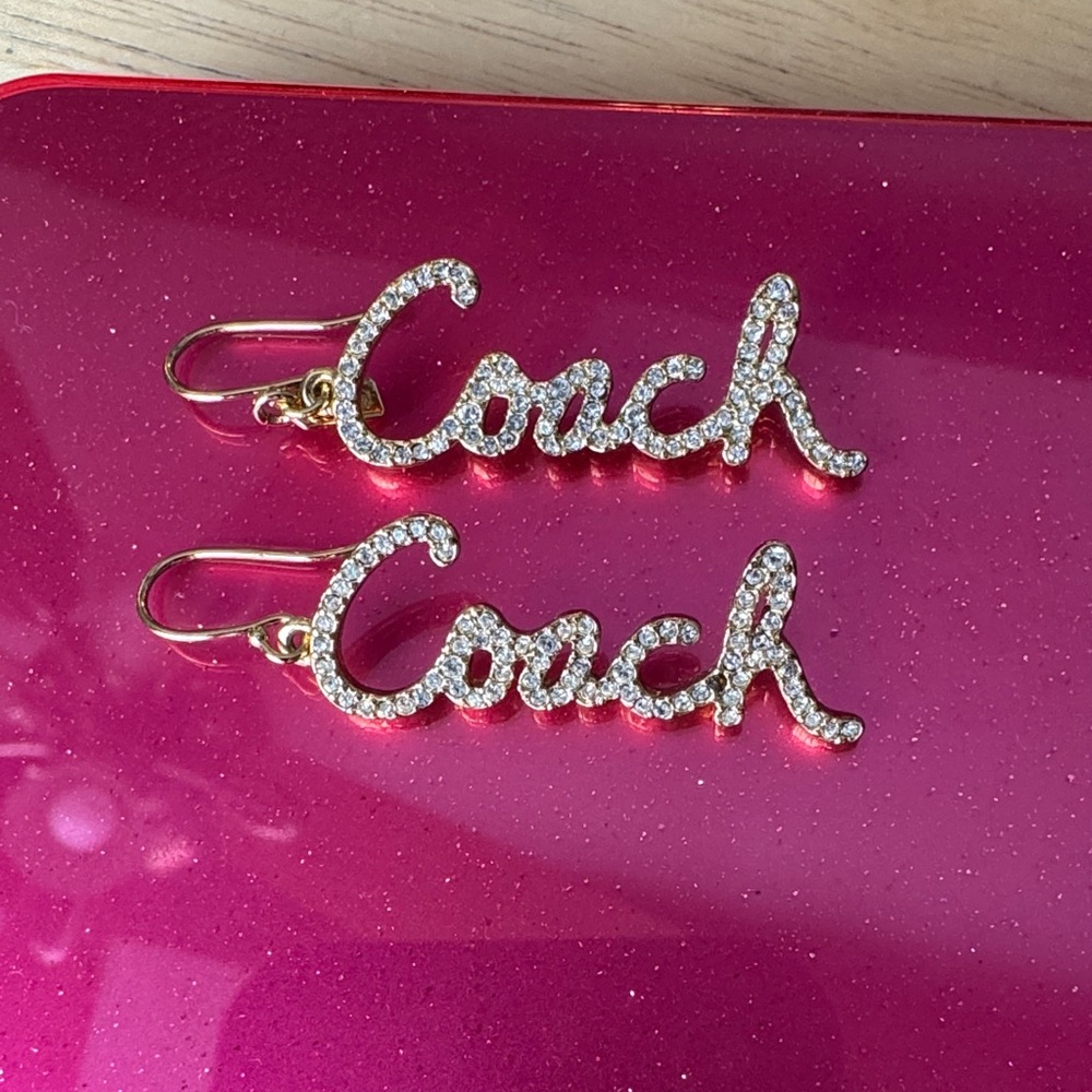 Coach Sparkling Goldtone Script Earrings